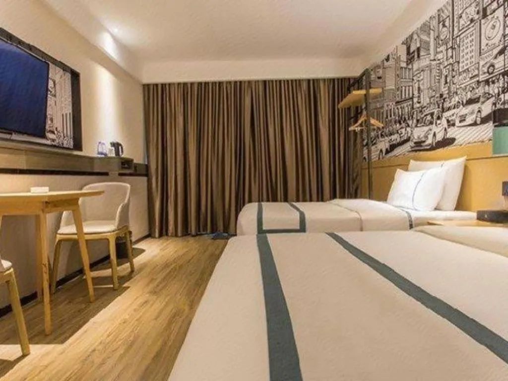 Bed in City Comfort Inn Liuzhou Chengzhong Wanda Haiguan