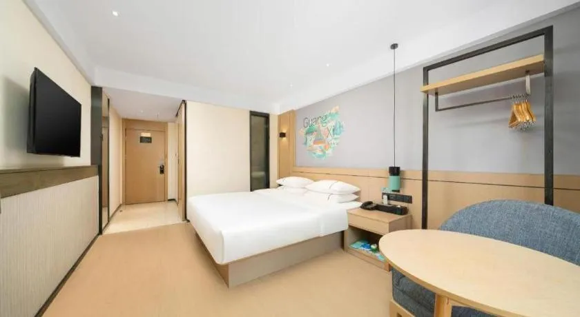 Bed in City Comfort Inn Liuzhou Chengzhong Wanda Haiguan