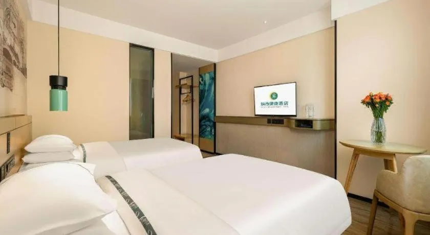Bed in City Comfort Inn Guigang Hecheng Wanda Plaza