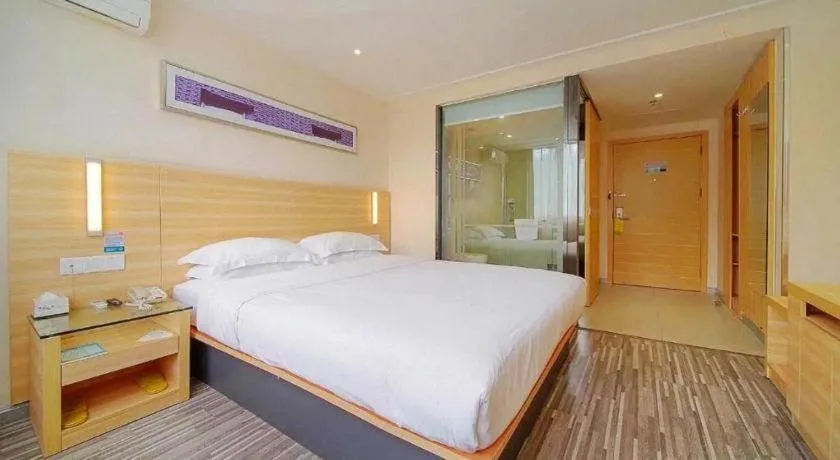 Bed in City Comfort Inn Zhongshan Dongsheng One Plus One