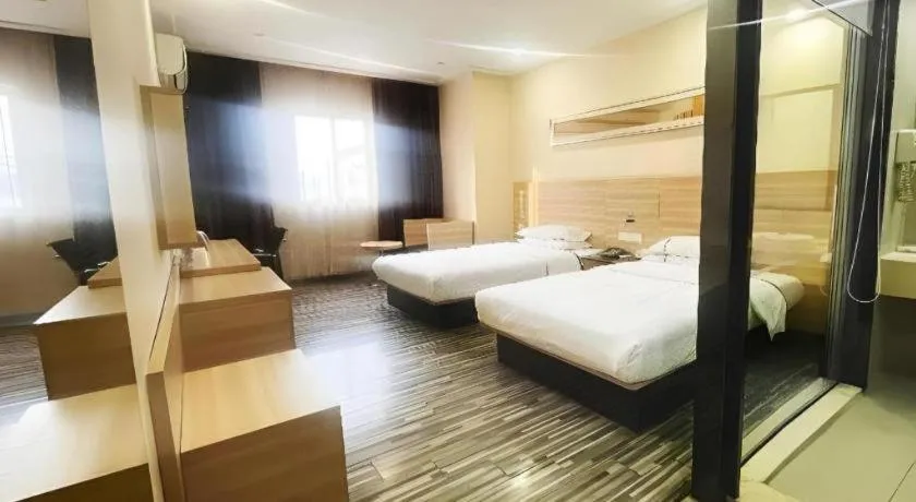 Bed in City Comfort Inn Zhongshan Dongsheng One Plus One