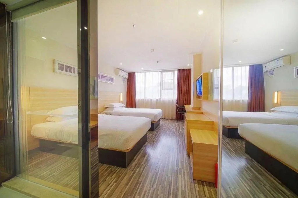 Bed in City Comfort Inn Zhongshan Dongsheng One Plus One