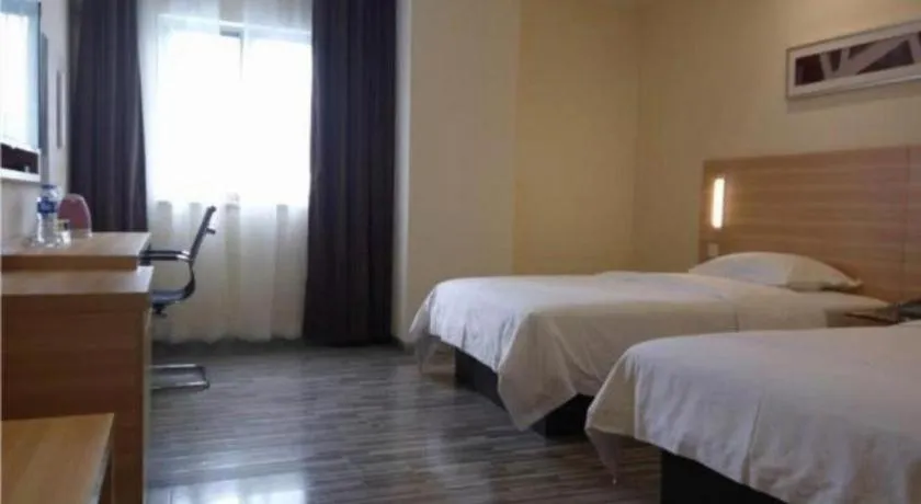 Bed in City Comfort Inn Zhongshan Dongsheng One Plus One