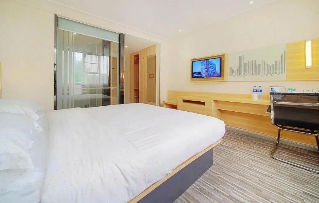 Bed in City Comfort Inn Zhongshan Dongsheng One Plus One