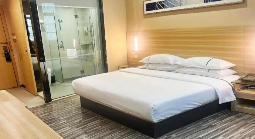 Bed in City Comfort Inn Zhongshan Dongsheng One Plus One