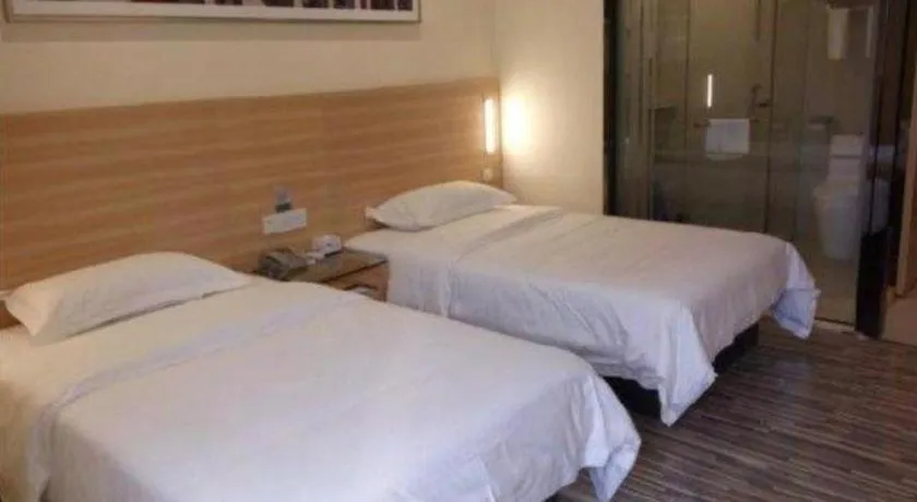 Bed in City Comfort Inn Zhongshan Dongsheng One Plus One