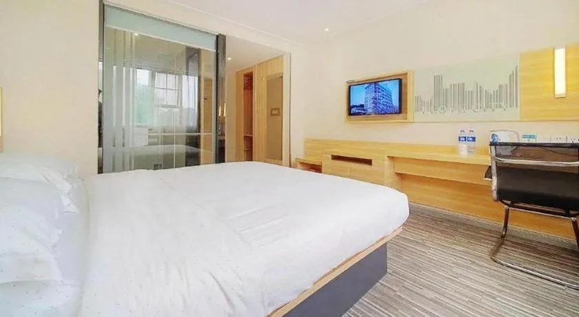 Bed in City Comfort Inn Zhongshan Dongsheng One Plus One