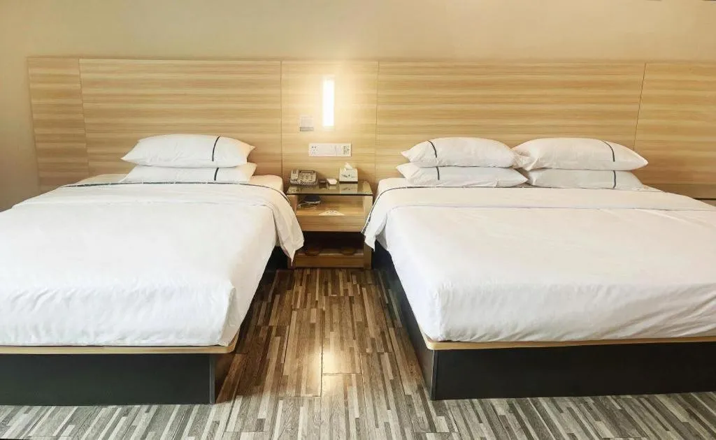 Bed in City Comfort Inn Zhongshan Dongsheng One Plus One