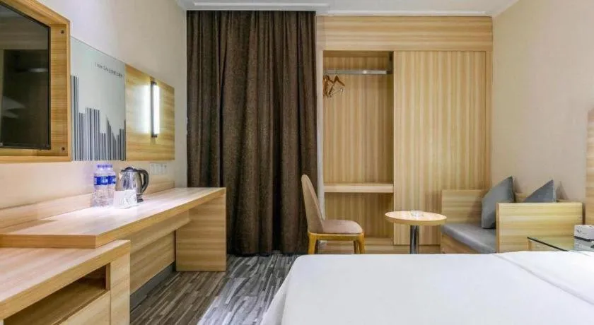 Bed in City Comfort Inn Zhongshan Dongsheng One Plus One