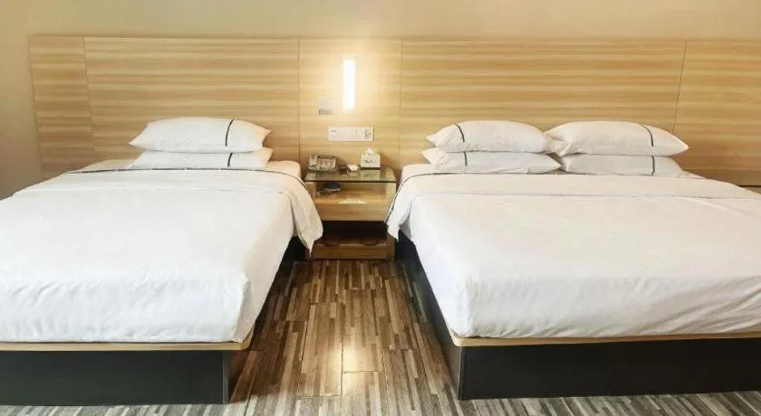 Bed in City Comfort Inn Zhongshan Dongsheng One Plus One
