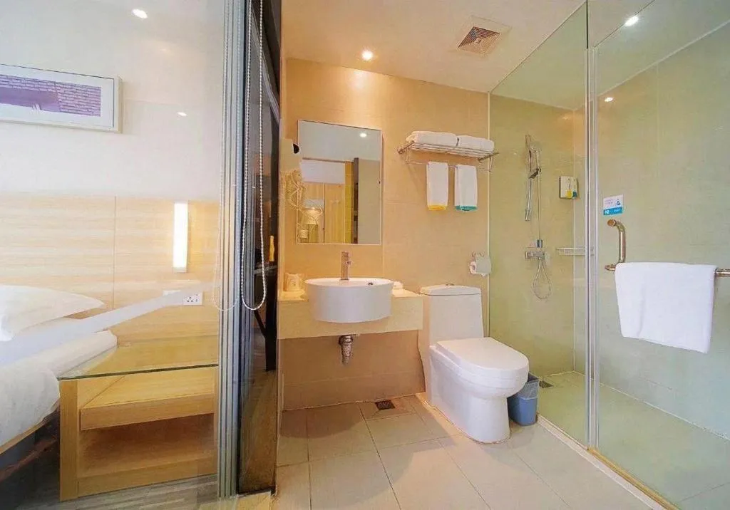 Bed in City Comfort Inn Zhongshan Dongsheng One Plus One