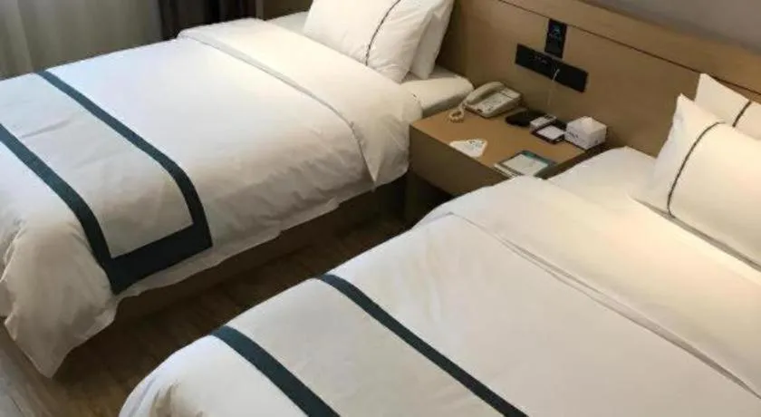 Bed in City Comfort Inn Jiangxia Wuchang University of Technology