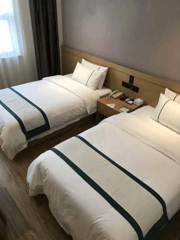 Bed in City Comfort Inn Jiangxia Wuchang University of Technology