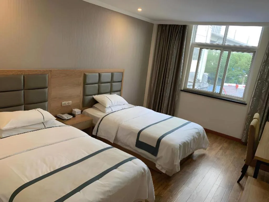 Bed in City Comfort Inn Jiangxia Wuchang University of Technology