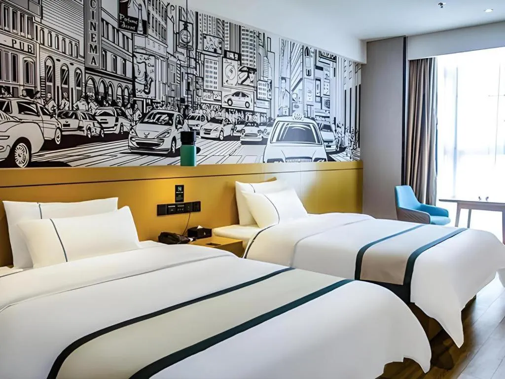 Bed in City Comfort Inn Liupanshui Sports Center