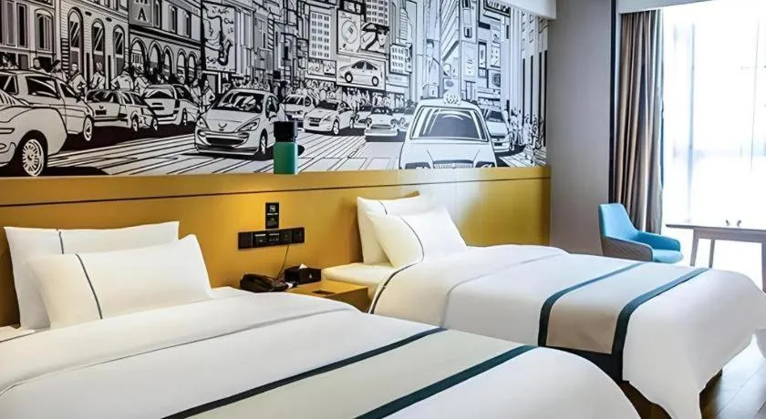Bed in City Comfort Inn Liupanshui Sports Center
