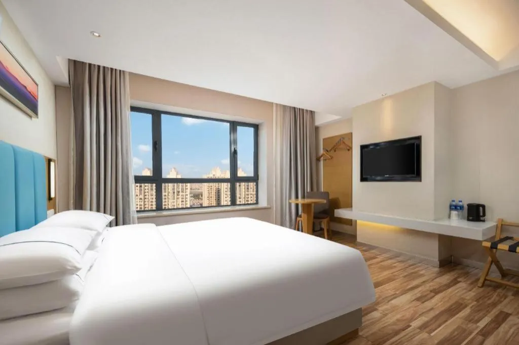 Bed in City Comfort Inn Jingzhou Wanda Plaza