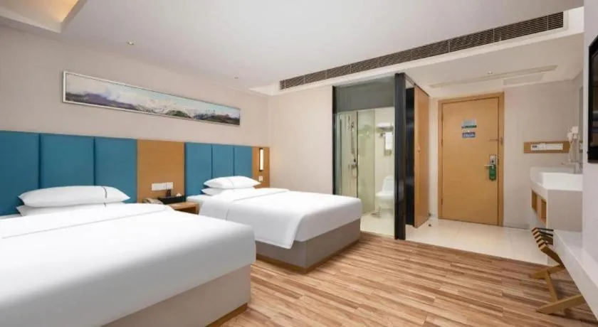 Bed in City Comfort Inn Jingzhou Wanda Plaza