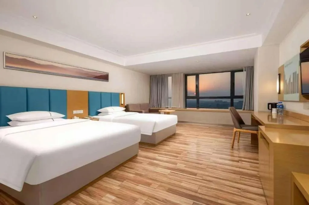 Bed in City Comfort Inn Jingzhou Wanda Plaza