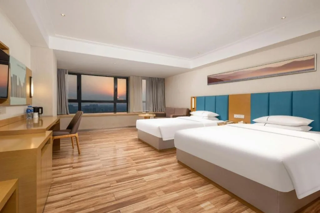 Bed in City Comfort Inn Jingzhou Wanda Plaza