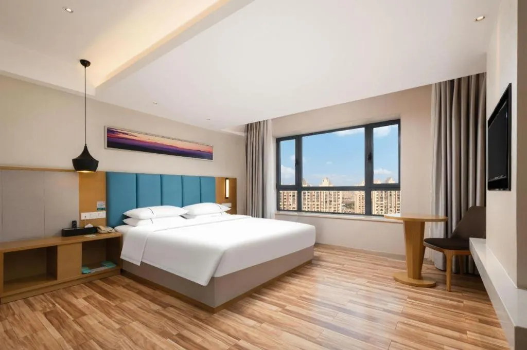 Bed in City Comfort Inn Jingzhou Wanda Plaza