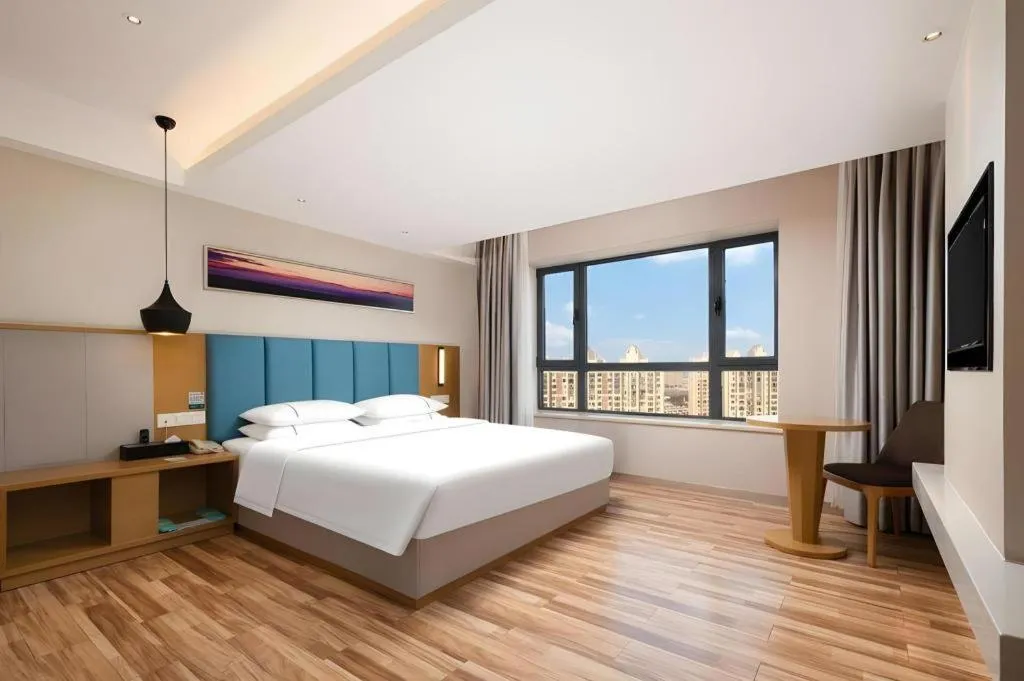 Bed in City Comfort Inn Jingzhou Wanda Plaza