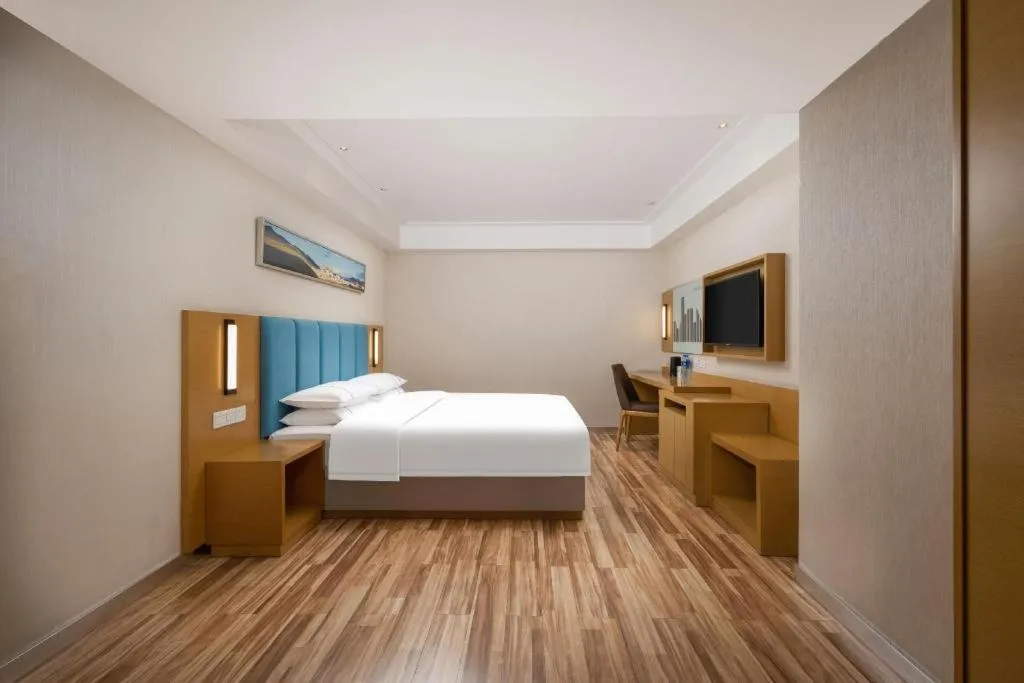 Bed in City Comfort Inn Jingzhou Wanda Plaza