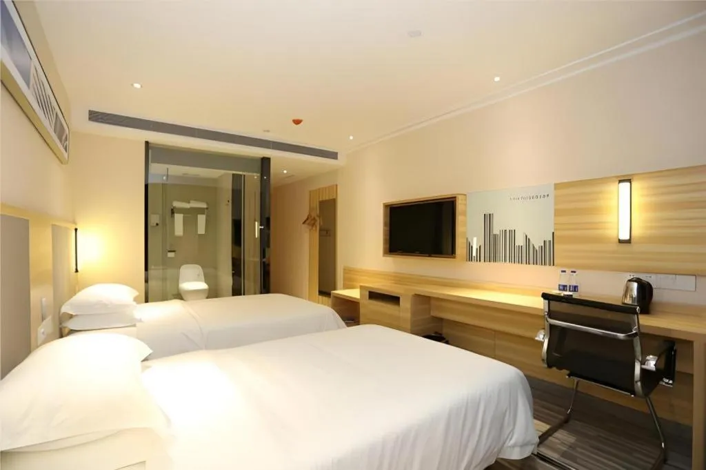 Bed in City Comfort Inn Changsha Jingwanzi Desiqin Plaza