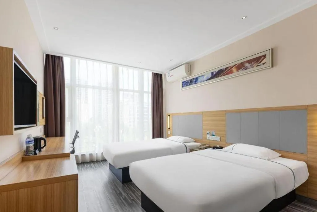Bed in City Comfort Inn Changsha Jingwanzi Desiqin Plaza