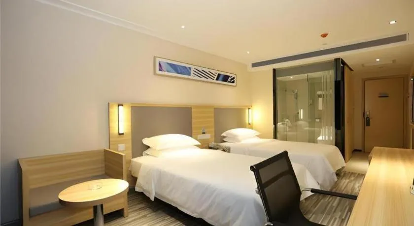 Bed in City Comfort Inn Changsha Jingwanzi Desiqin Plaza