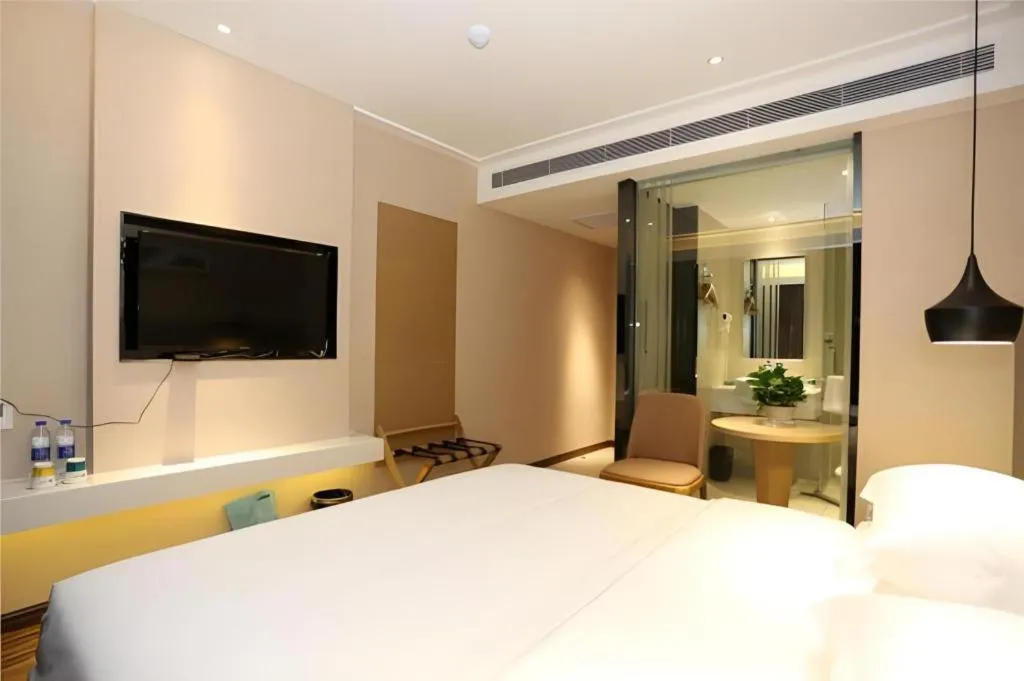 Bed in City Comfort Inn Changsha Jingwanzi Desiqin Plaza