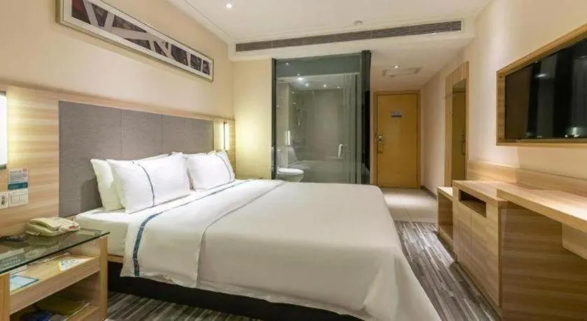 Bed in City Comfort Inn Changsha Jingwanzi Desiqin Plaza