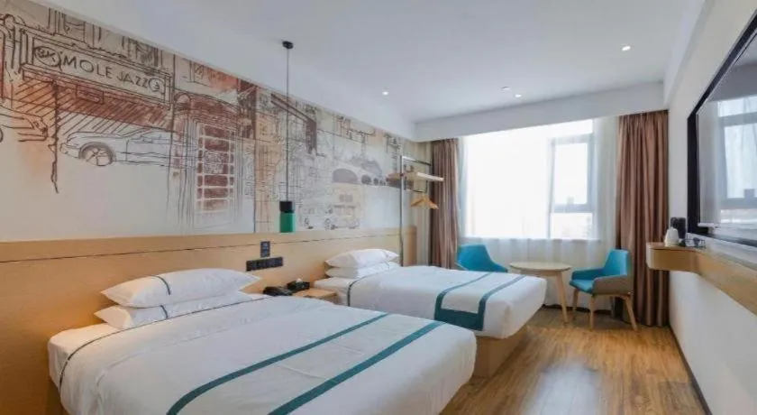 Bed in City Comfort Inn Wuhan Daxueyuan Road Qingfeng Villa