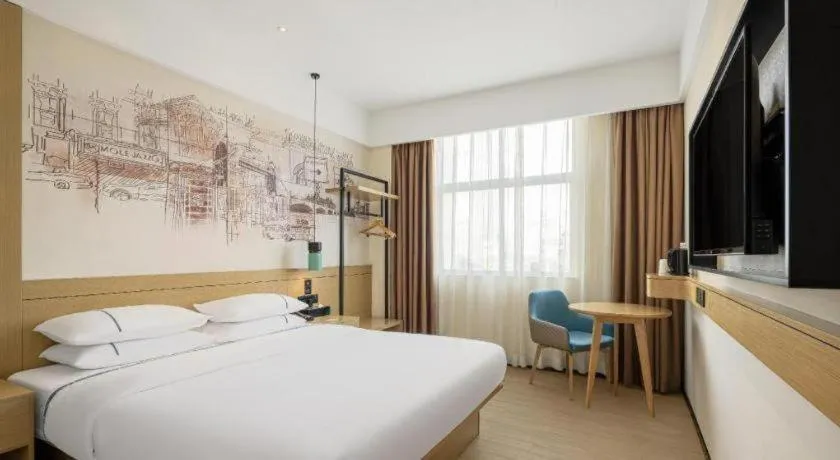 Bed in City Comfort Inn Wuhan Daxueyuan Road Qingfeng Villa