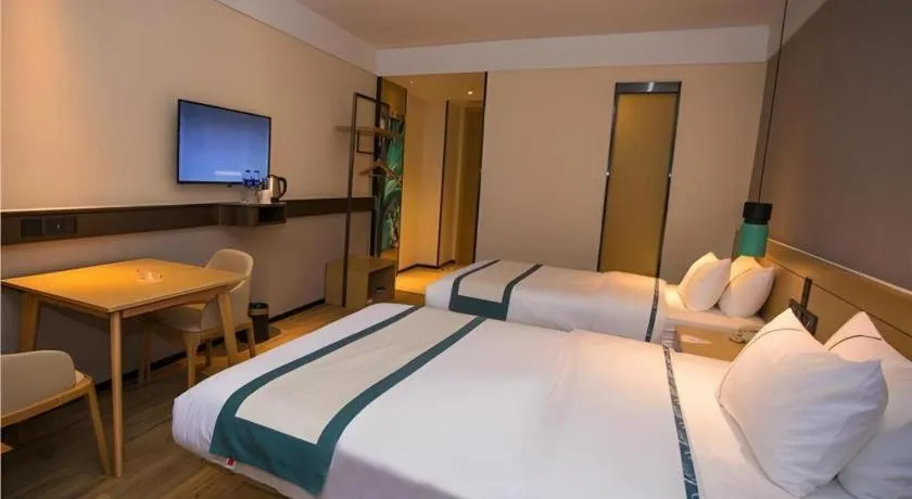 Bed in City Comfort Inn Wuhan Daxueyuan Road Qingfeng Villa