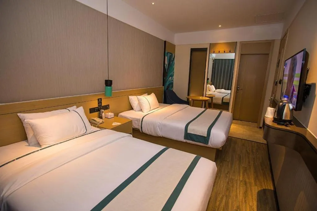 Bed in City Comfort Inn Wuhan Daxueyuan Road Qingfeng Villa