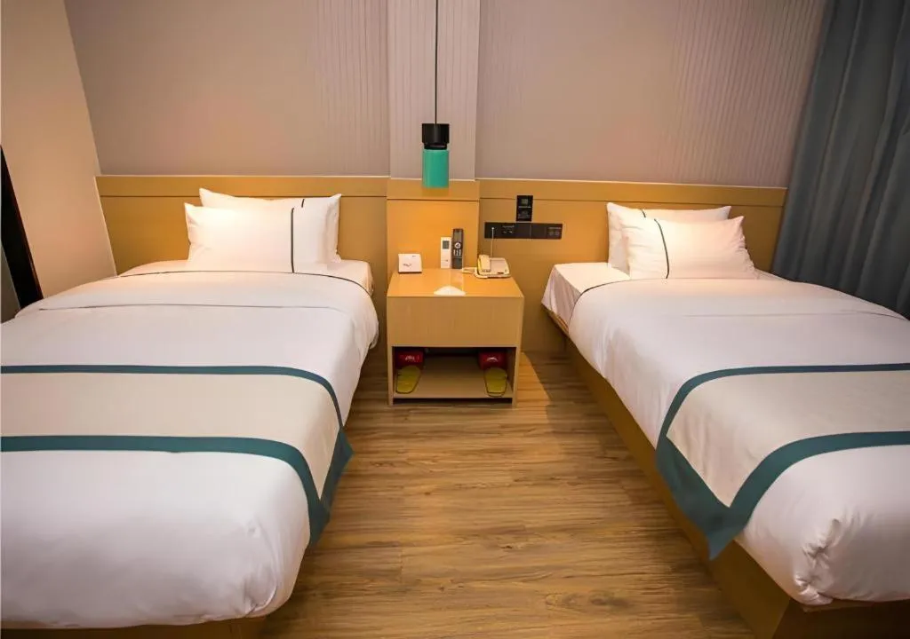 Bed in City Comfort Inn Wuhan Daxueyuan Road Qingfeng Villa