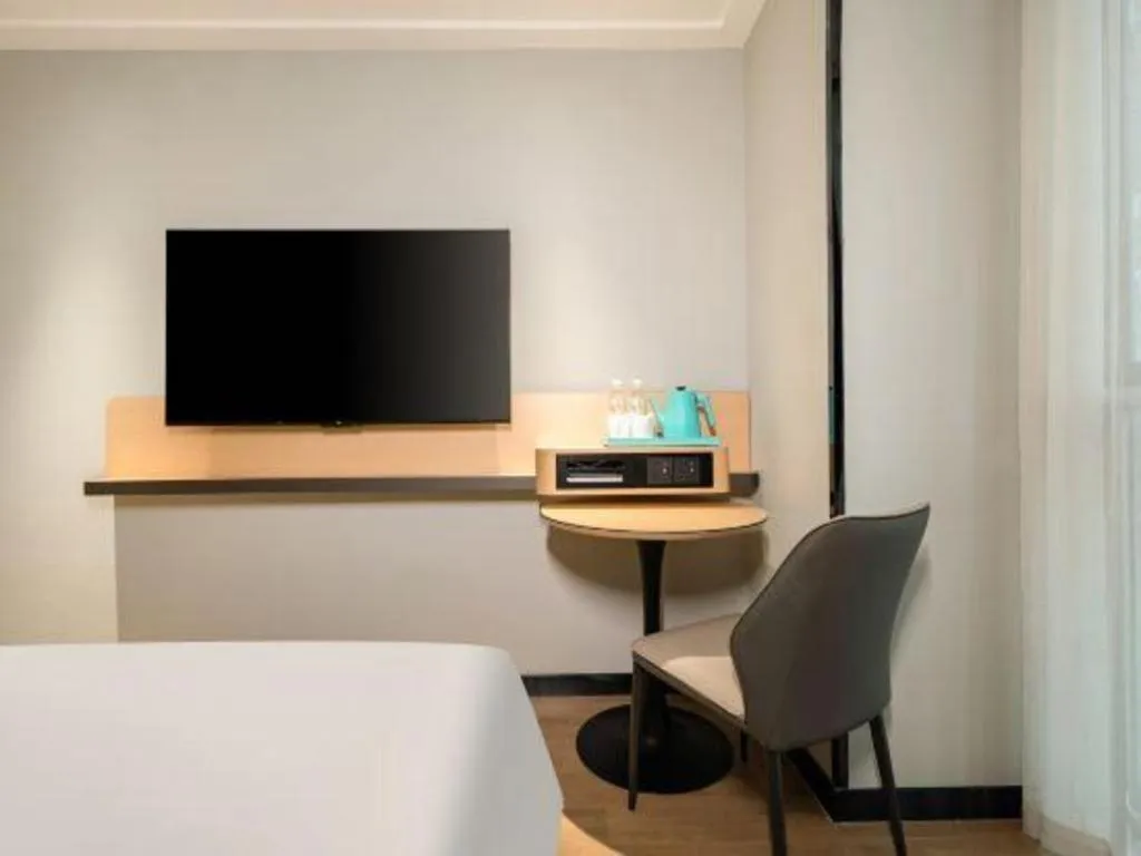 Bed in City Comfort Inn Hechi Chengxi Avenue