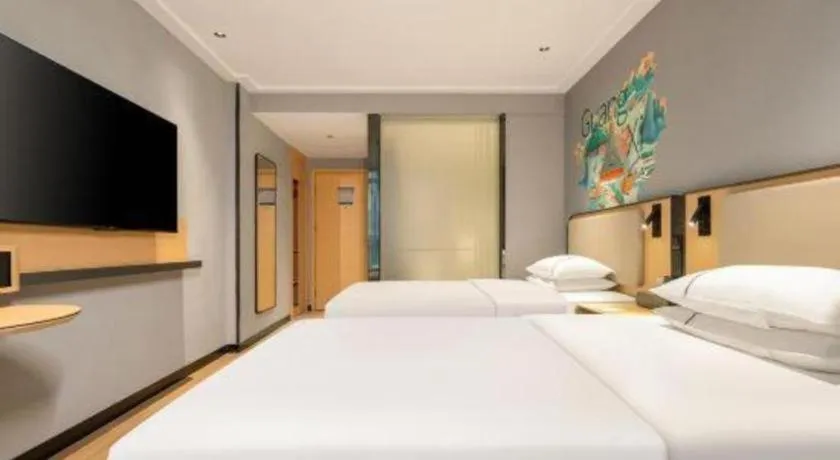 Bed in City Comfort Inn Hechi Chengxi Avenue