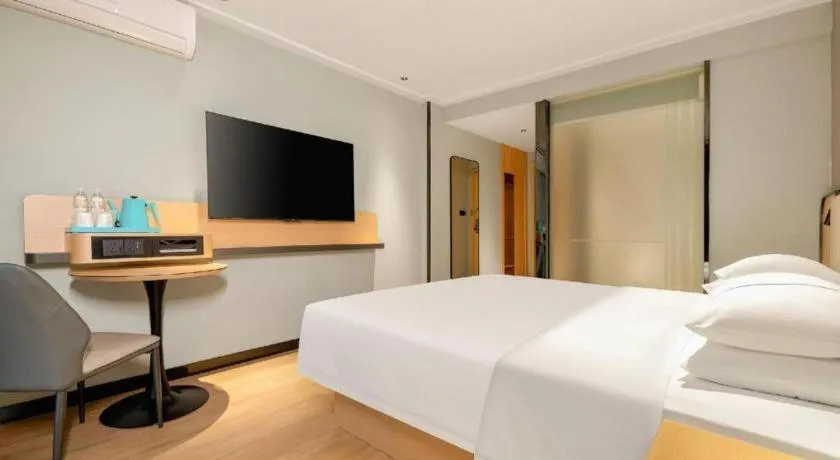 Bed in City Comfort Inn Hechi Chengxi Avenue