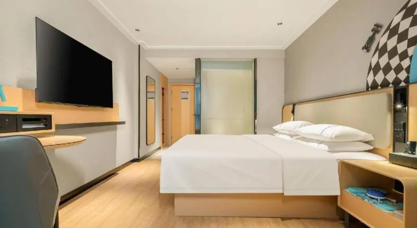 Bed in City Comfort Inn Hechi Chengxi Avenue