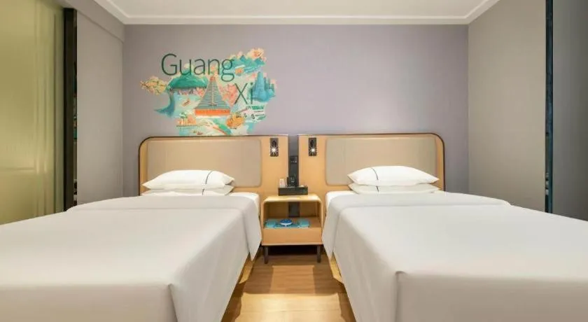 Bed in City Comfort Inn Hechi Chengxi Avenue