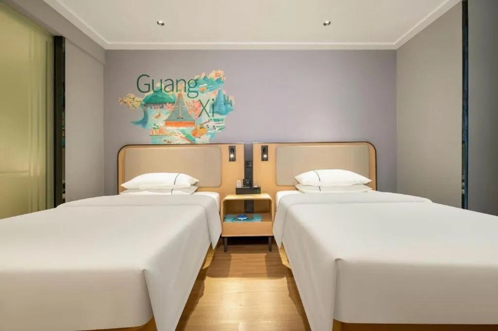 Bed in City Comfort Inn Hechi Chengxi Avenue