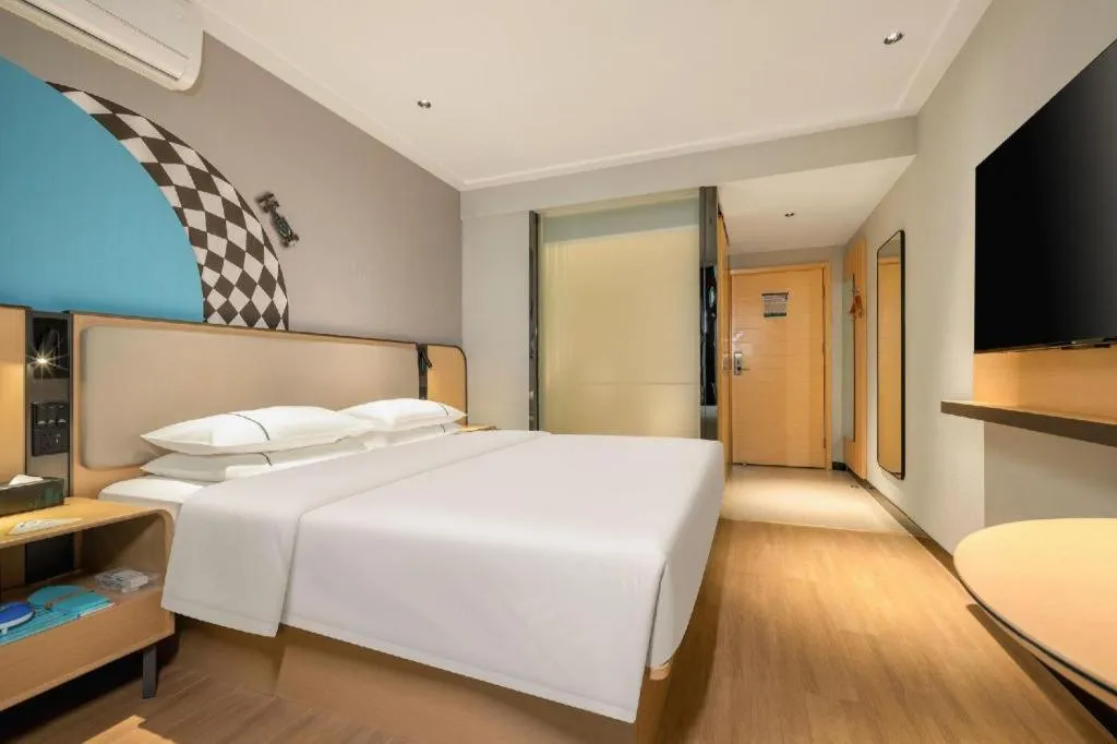 Bed in City Comfort Inn Hechi Chengxi Avenue