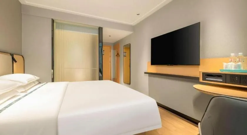 Bed in City Comfort Inn Hechi Chengxi Avenue