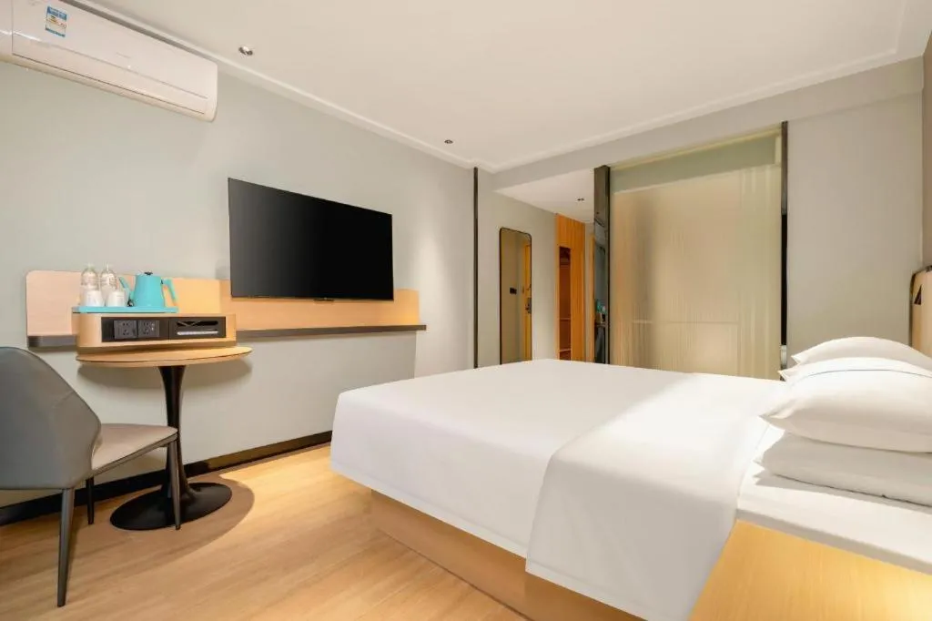 Bed in City Comfort Inn Hechi Chengxi Avenue