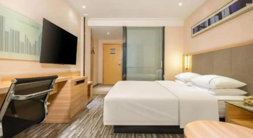 Bed in City Comfort Inn Hechi Chengxi Avenue