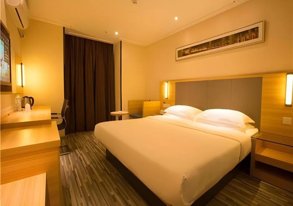 Bed in City Comfort Inn Hechi Chengxi Avenue