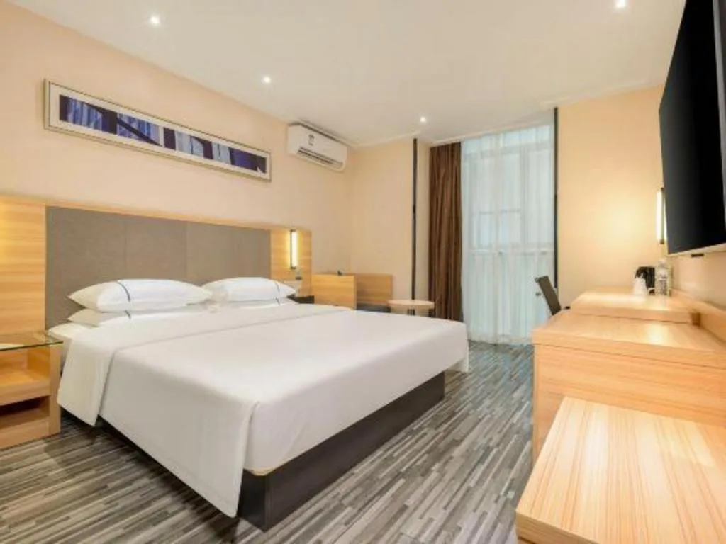 Bed in City Comfort Inn Hechi Chengxi Avenue