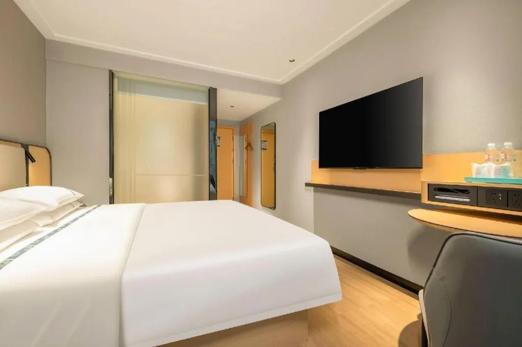 Bed in City Comfort Inn Hechi Chengxi Avenue
